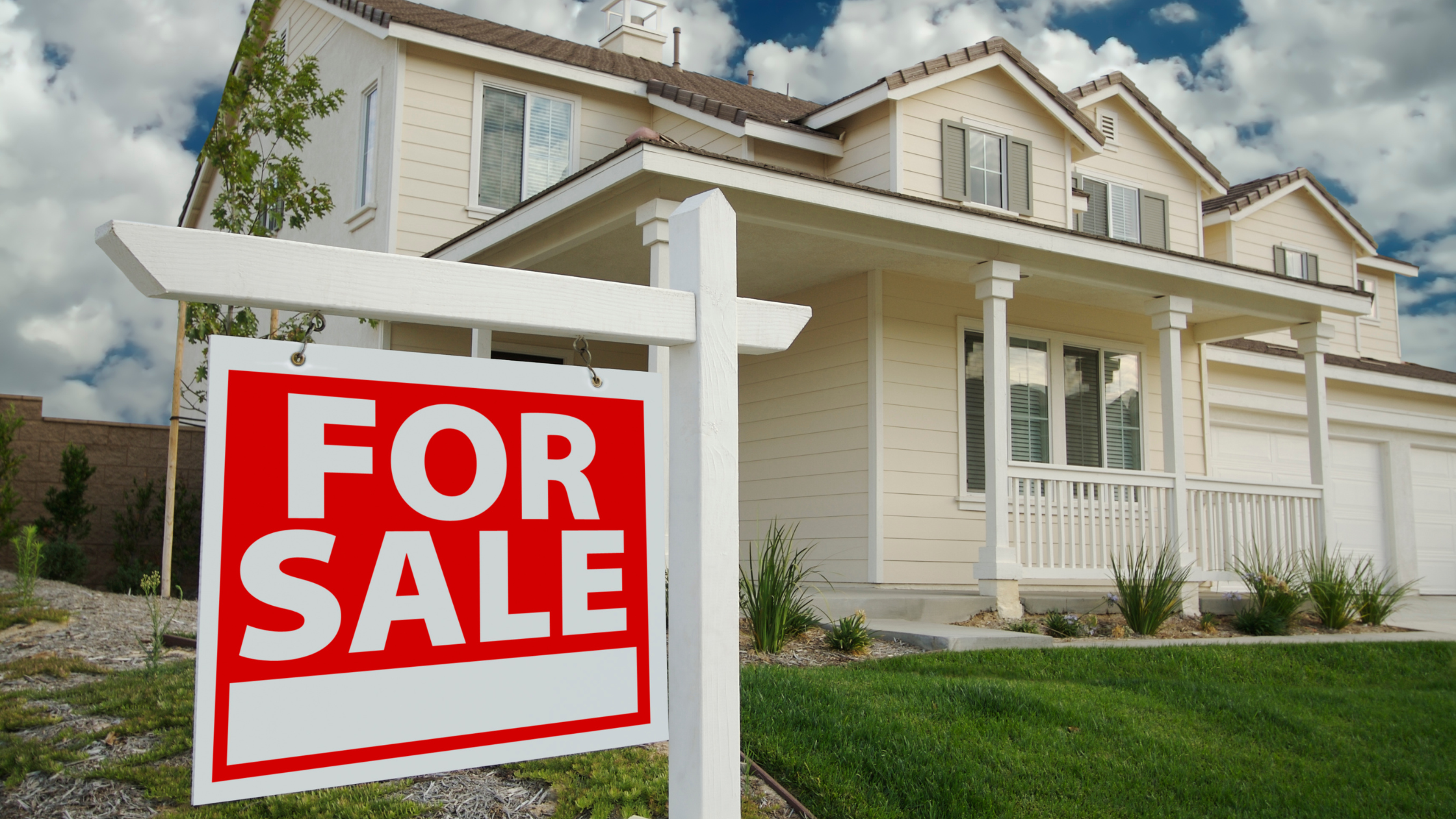Jacksonville home for sale sign in front yard of a clean, well-maintained house ready for buyers and inspections
